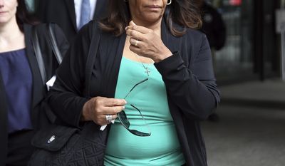 Barbara Byrd-Bennett leaves the Dirksen U.S. Courthouse in Chicago on Friday, April 28, 2017, after being sentenced for her role in a bribery scandal. The former head of Chicago Public Schools was sentenced to more than four years in prison on Friday for steering $23 million in city contracts to education firms for a cut of more than $2 million in kickbacks.(Terrence Antonio James/Chicago Tribune via AP)