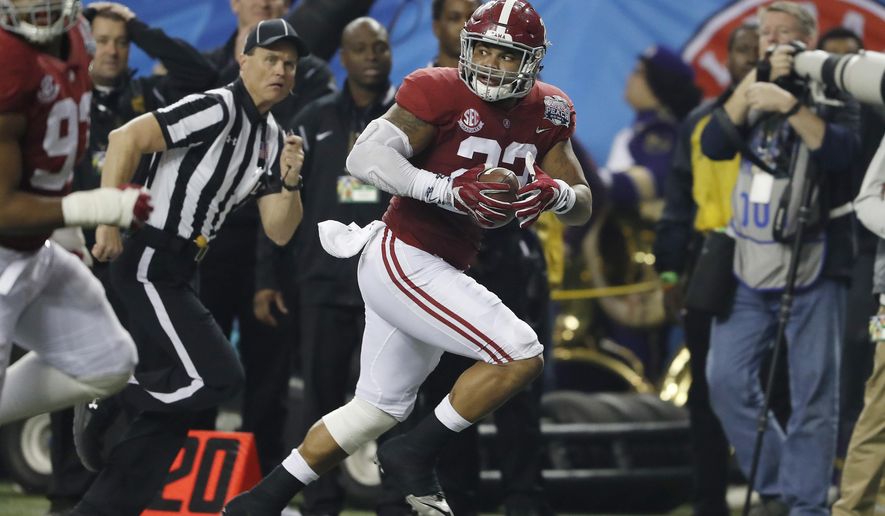 FILE - In this Dec. 31, 2016, file photo, Alabama linebacker Ryan Anderson (22) runs toward the end zone for a touchdown against Washington after an interception during the Peach Bowl NCAA college football playoff game in Atlanta. The Washington Redskins selected Anderson in the NFL draft Friday, April 28. (AP Photo/John Bazemore, File)