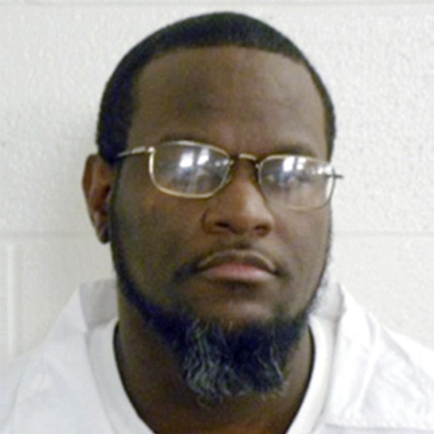 FILE - This undated file photo provided by the Arkansas Department of Correction shows Kenneth Williams, who was executed with the use of the sedative midazolam on April 27, 2017, in Varner, Ark. During the execution, Williams' chest leaped forward against the leather restraint that secured him to the stainless steel gurney. Fifteen times came in quick succession, followed by five more at a slower pace. A coroner pronounced Williams dead 13 minutes after the execution began. Questions about whether midazolam can prevent prisoners from suffering while they die have persisted since several states in 2014 began using the drug as part of their lethal injection protocols. (Arkansas Department of Correction via AP, File)