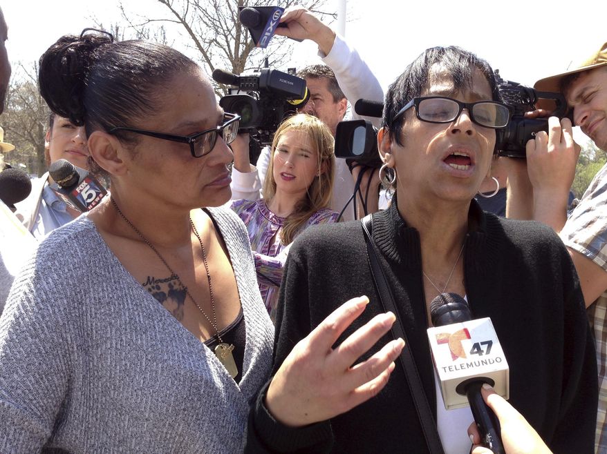 Evelyn Rodriguez, right, and Elizabeth Alvarado, left, speak with reporters outside the U.S. District Courthouse in Central Islip, N.Y., on Friday, April 28, 2017. The women are the mothers of Kayla Cuevas (Rodriguez's daughter) and Nisa Mickens (Alvarado's daughter), two teenagers who were beaten and slashed to death in September 2016 in a suspected MS-13 gang killing in Brentwood, N.Y. They met Friday with U.S. Attorney General Jeff Sessions to discuss efforts to stem gang violence in their Long Island community. (AP Photo/Frank Eltman)