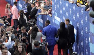 Alabama&#39;s Cam Robinson arrives for the first round of the 2017 NFL football draft, Thursday, April 27, 2017, in Philadelphia. (AP Photo/Julio Cortez)