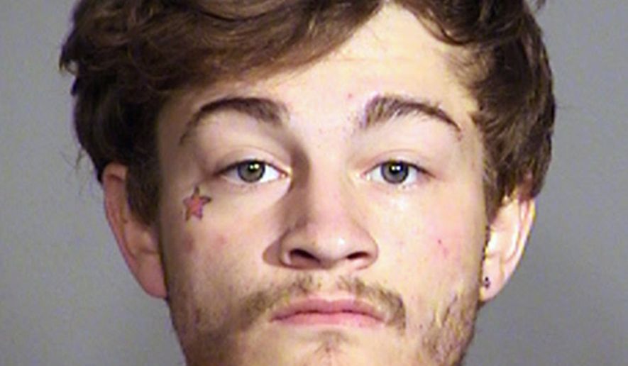 FILE - This file photo provided by the Indianapolis Metropolitan Police Department shows Johnathan Cruz of Indianapolis. Marion County court records show that Cruz pleaded guilty Friday, April 28, 2017, to killing three people over four days last spring in attacks that authorities say he justified by citing the horror movie, "The Purge." (Indianapolis Metropolitan Police Department via AP, File)