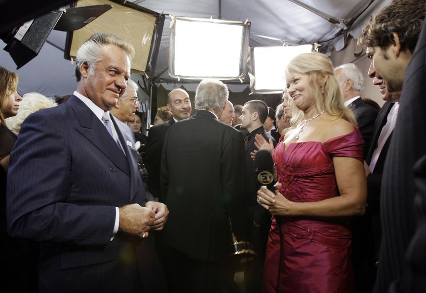 FILE - In this Sunday, Sept. 16, 2007 file photo, Tony Sirico from the TV series The Sopranos, left, talks with Entertainment Tonight reporter Mary Hart at the 59th Primetime Emmy Awards at the Shrine Auditorium in Los Angeles. Hart's legacy in entertainment news will be recognized Sunday, April 30, 2017 with a lifetime achievement award at the Daytime Emmys ceremony. (AP Photo/Kevork Djansezian)