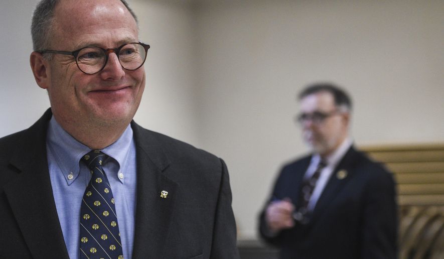 ADVANCE FOR SATURDAY, APRIL 29, 2017 -In this Friday, Feb. 19, 2016 photo, James Redford, new interim director at the Grand Rapids Home for Veterans, smiles as he walks out after a press conference following a scathing audit report showing a number of problems at the home, in Grand Rapids, Mich. (Taylor Ballek /The Grand Rapids Press via AP)