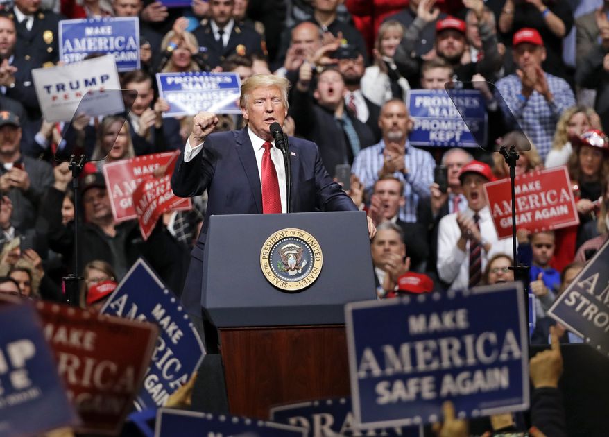 DAY 55 - In this March 15, 2017, file photo, President Donald Trump speaks at a rally in Nashville, Tenn. (AP Photo/Mark Humphrey, File)