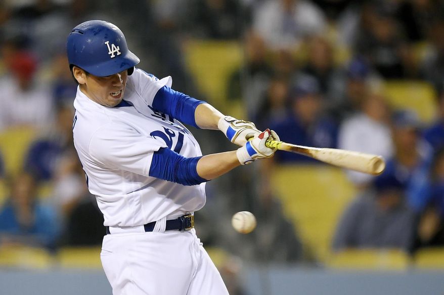 Los Angeles Dodgers' Kenta Maeda swings at a pitch during the third inning of a baseball game against the Philadelphia Phillies, Friday, April 28, 2017, in Los Angeles. (AP Photo/Mark J. Terrill)