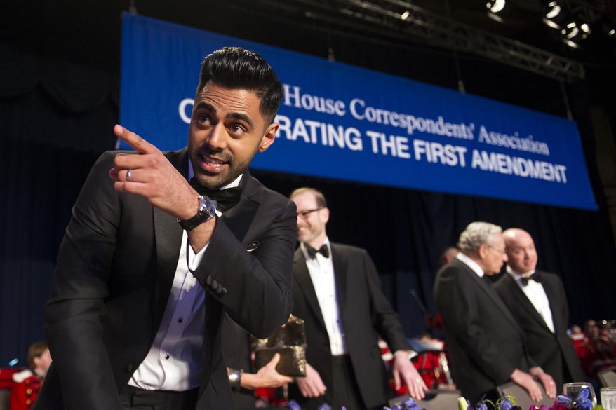 In this file photo, The Daily Show correspondent Hasan Minhaj stands at the head table during the White House Correspondents&#x27; Dinner in Washington, Saturday, April 29, 2017. President Trump has refused to attend the WHCA dinners during his presidency, and now the 2020 event has been canceled after initially being postponed to late August, with the organization&#x27;s president Jonathan Karl saying there simply was no way to safely host the ceremony given concerns over coronavirus. (AP Photo/Cliff Owen)  **FILE**