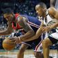 Boston Celtics&#39; Avery Bradley, right, knocks the ball away from Washington Wizards&#39; Bradley Beal during the fourth quarter of a second-round NBA playoff series basketball game, Sunday, April, 30, 2017, in Boston. The Celtics won 123-111. (AP Photo/Michael Dwyer)
