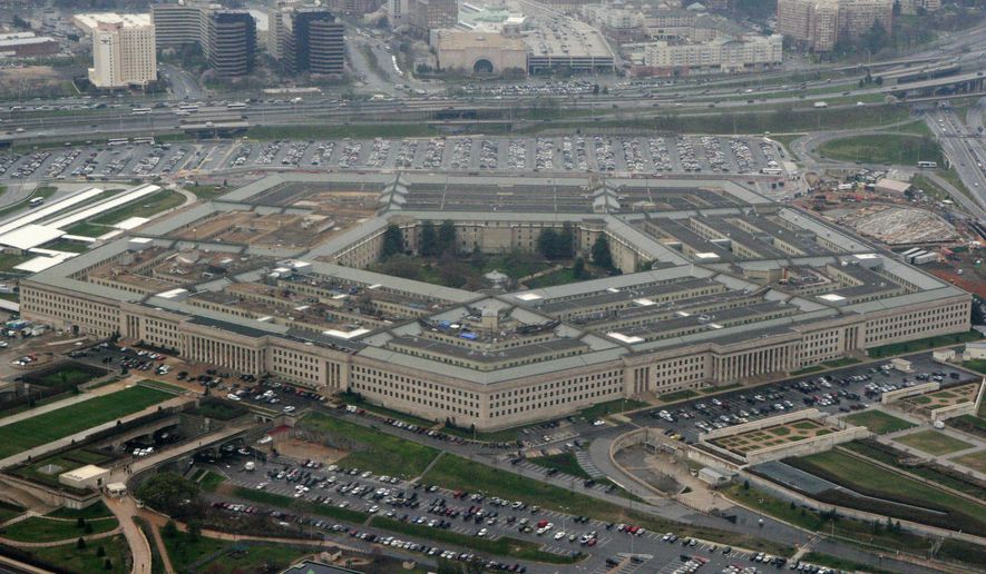 In this photo taken March 27, 2008, the Pentagon is seen in this aerial view. (AP Photo/Charles Dharapak)