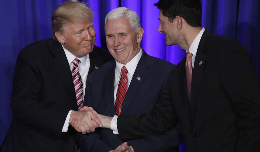 President Donald Trump, accompanied by Vice President Mike Pence, shakes hands with House Speaker Paul Ryan of Wis., before speaking at the Republican congressional retreat in Philadelphia, Jan. 26, 2017. (AP Photo/Matt Rourke) ** FILE **
