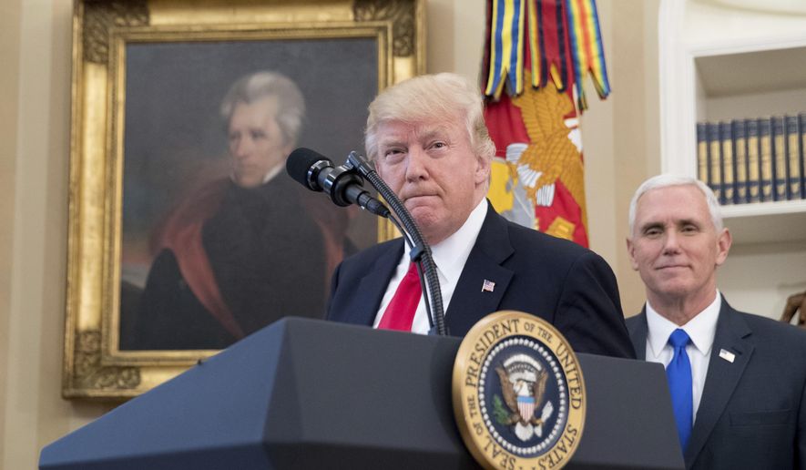 In this March 31, 2017 file photo, a portrait of former President Andrew Jackson hangs on the wall behind President Donald Trump, accompanied by Vice President Mike Pence, in the Oval Office at the White House in Washington. President Donald Trump made puzzling claims about Andrew Jackson and the Civil War in an interview, suggesting that he was uncertain about the origin of the conflict while claiming that Jackson was upset about the war that started more than a decade after his death.  (AP Photo/Andrew Harnik, File)
