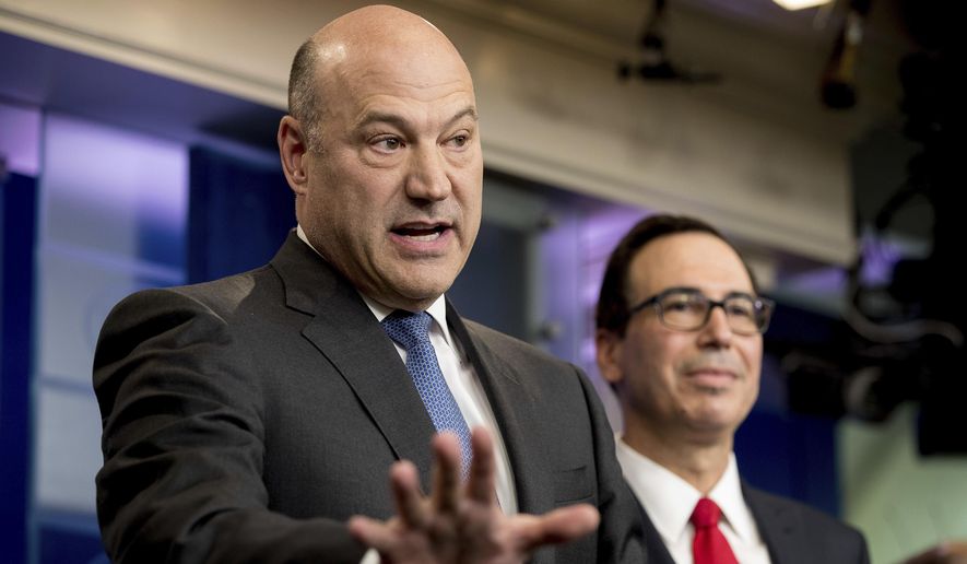 National Economic Director Gary Cohn, left, accompanied by Treasury Secretary Steve Mnuchin, speaks in the briefing room of the White House, in Washington, Wednesday, April 26, 2017, where they discussed President Donald Trump tax proposals. (AP Photo/Andrew Harnik) ** FILE **