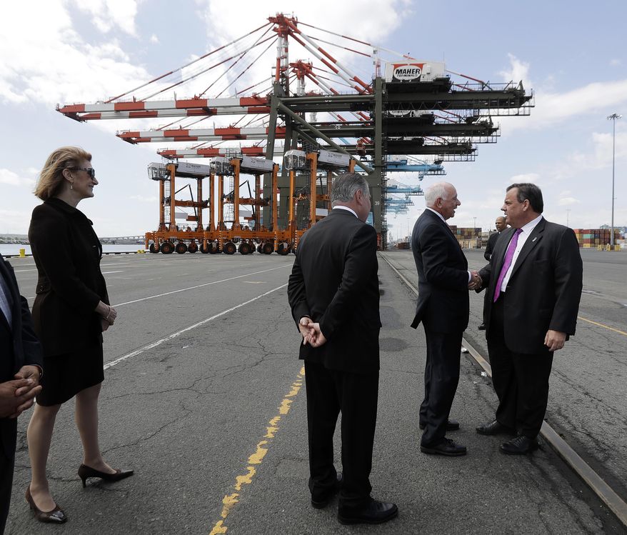 New Jersey Gov. Chris Christie, right, talks to John Degnan, chairman of the Port Authority of New York and New Jersey, prior to a news conference announcing the Bayonne Bridge project completion, Tuesday, May 2, 2017, at the at Maher Terminals in the Port of Elizabeth in Elizabeth, N.J. Christie announced that as of June 30, the $1.6 billion raising of the Bayonne Bridge roadway will be completed, six months ahead of its year-end schedule. (AP Photo/Julio Cortez)