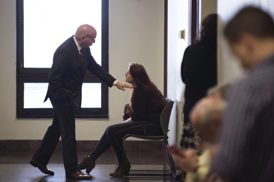 Attorney Joseph Sorrentino, left, speaks with his client Julia Stensky, a former girlfriend of David Creato, before she testifies in his trial Tuesday, May 2, 2017, in Camden, NJ. Creato is accused of killing his 3-year-old son in October 2015 because he allegedly was an impediment to his relationship with a teenage girlfriend. (Joe Lambert/Camden Courier-Post via AP, Pool)