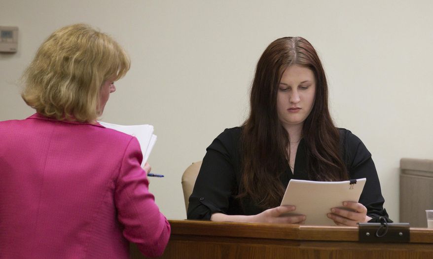 Assistant prosecutor Christine Shah questions Julia Stensky, right, as she looks over a transcript while testifying at the murder trial of her former boyfriend, David Creato, Tuesday, May 2, 2017, in Camden N.J. Creato is accused of killing his 3-year-old son in October 2015 because he allegedly was an impediment to his relationship with a teenage girlfriend. ( Jessica Griffin/The Philadelphia Inquirer via AP, Pool)