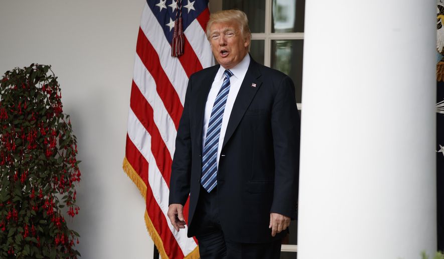President Donald Trump talks with reporters as he walks to the Oval Office of the White House in Washington, Tuesday, May 2, 2017. President Donald Trump says the nation &amp;quot;needs a good `shutdown&#39; in September&amp;quot; to fix a &amp;quot;mess&amp;quot; in the Senate, saying on Twitter that the country needs to &amp;quot;either elect more Republican Senators in 2018 or change the rules now to 51 (percent),&amp;quot; suggesting more rules changes ahead in the Senate.  (AP Photo/Evan Vucci)