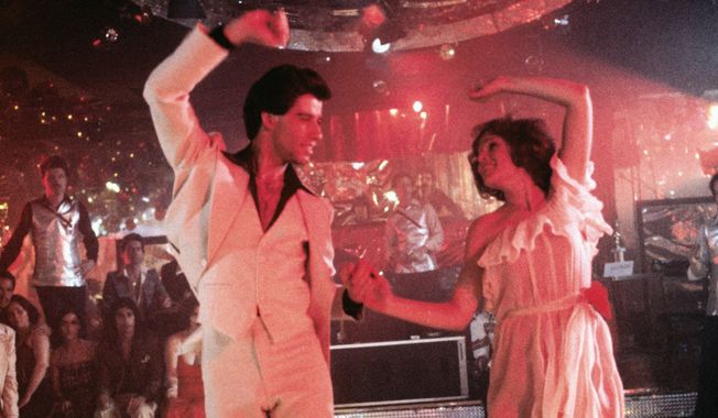 Donna Pescow and John Travolta in a scene from &quot;Saturday Night Fever.&quot;  
