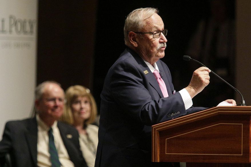 Donor Bill Frost speaks at the announcement of the largest gift in Cal State history on Wednesday, May 3, 2017, at California Polytechnic State University, San Luis Obispo, Calif. He and his wife, Linda Frost, gave $110 million to Cal Poly's College of Science and Mathematics. From left are College of Math and Science Dean Philip Bailey and Linda Frost. (David Middlecamp /The Tribune (of San Luis Obispo) via AP)