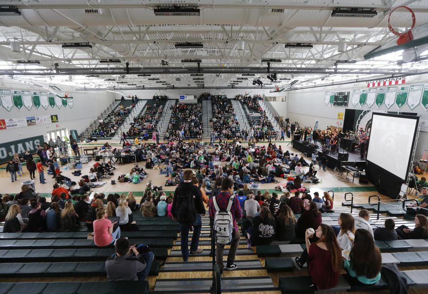 In a Friday, April 28, 2017 photo, students fill the gym for the Rodstock music festival and fundraiser at Kelly Walsh High School in Casper, Wyo. Rodstock is an all-day music festival for Make-A-Wish Wyoming that has raised tens of thousands of dollars for sick children. (Alan Rogers/The Casper Star-Tribune via AP)