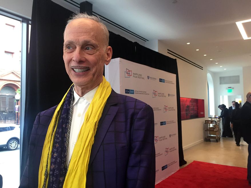In this April 20, 2017 photo, filmmaker John Waters attends a preview event at the newly-rehabilitated Parkway Theater in Baltimore. The Maryland Film Festival is kicking off its 19th year in its new home at the Parkway Theater, and the festival's organizers hope the new theater will support and foster the city's already robust art and film community. (AP Photo/Juliet Linderman)