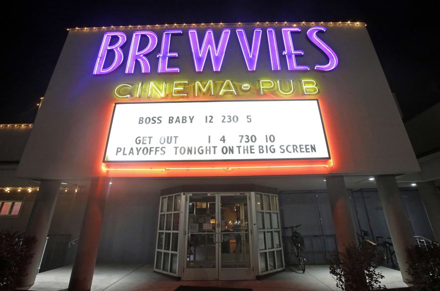 In this Tuesday, May 2, 2017, photo, Breweries Cinema Pub announce they are showing the Utah Jazz-Golden State Warriors NBA basketball playoff game on their marquee in Salt Lake City. Salt Lake City leaders and tourism officials playfully jabbed back at Golden State Warriors players who bemoaned the lack of nightlife in Utah, hoping to combat the predominantly Mormon state's reputation as a boring place where it's tough to get a drink. The tourism agency in the state capital launched a new website and video Monday titled, "There's nothing to do in Salt Lake" that features people enjoying drinks and food at popular breweries, bars, restaurants and sporting venues. (AP Photo/Rick Bowmer)