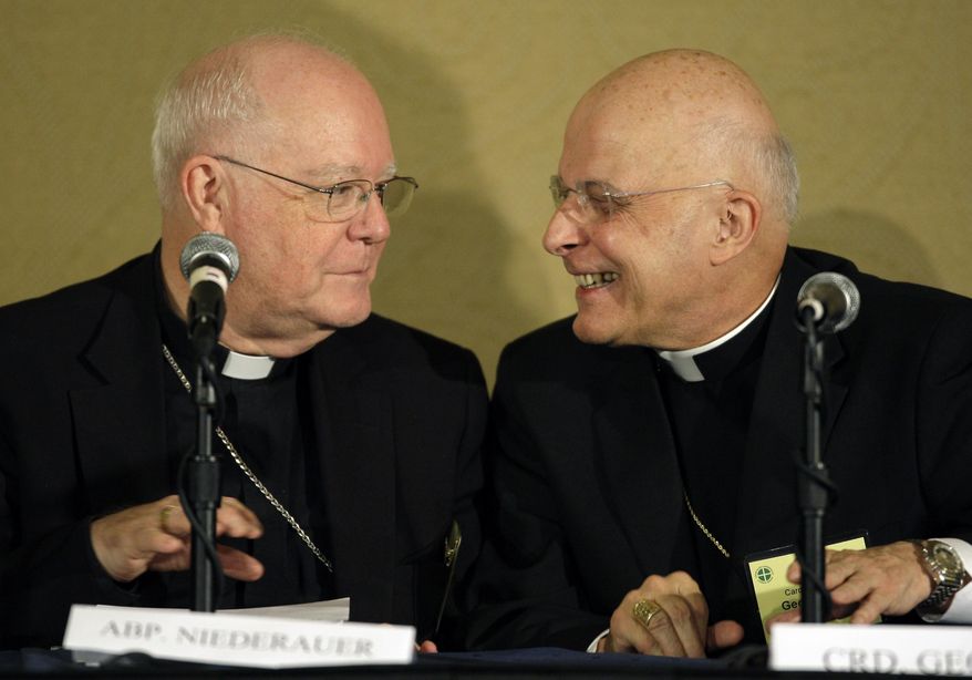 FILE - In this Nov. 16, 2009, file photo, Archbishop George H. Niederauer, left, and Chicago Cardinal Francis George, the president of the U.S. Conference of Catholic Bishops, share a laugh after a news conference in Baltimore. Niederauer, San Francisco's eighth archbishop and a leading proponent of a contentious 2008 California ballot measure to ban same-sex marriage died Tuesday, May 2, 2017, of lung cancer at a San Rafael, California care facility. He was 80. ( (AP Photo/Rob Carr, File)