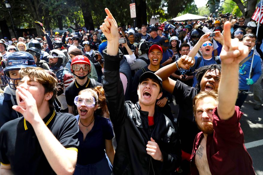 Demonstrators protest against Ann Coulter and her recent scheduled appearance on the campus of the University of California, Berkeley. (Associated Press)