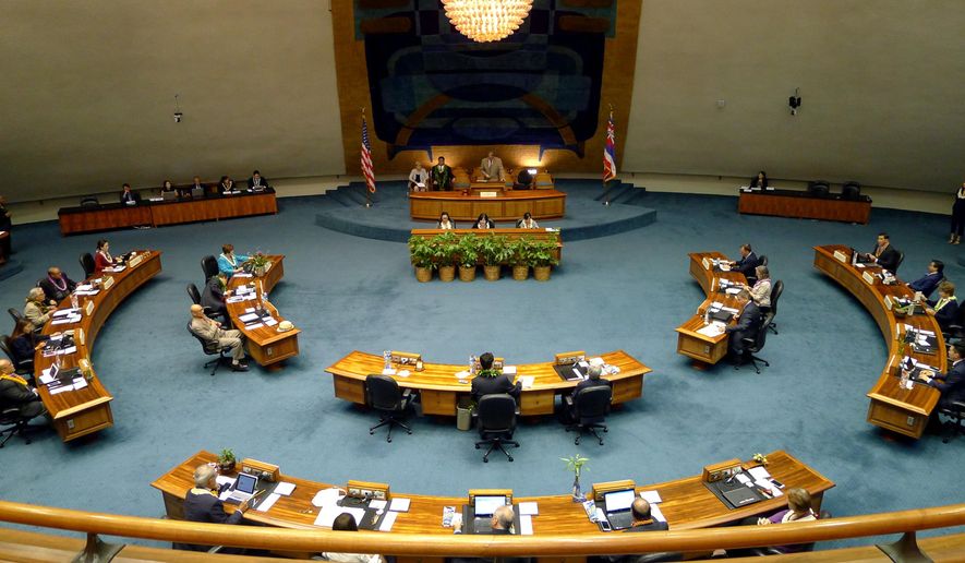 Hawaii Senators meet for the last day of the 2017 legislative session on Thursday, May 4, 2017, in Honolulu. Many bills died at the last minute as lawmakers focused on reaching on agreement to fund the troubled Honolulu rail transit project, but that bill also died. (AP Photo/Cathy Bussewitz)