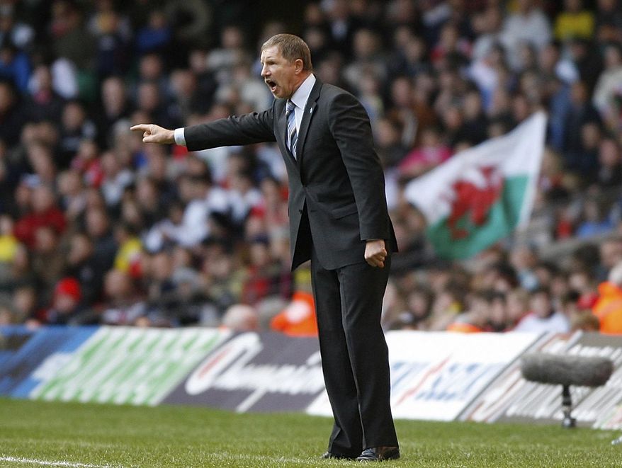 FILE - In this Saturday, March 28, 2009 file photo, Finland manager Stuart Baxter gestures during the World Cup group 4 qualifying soccer match against Wales at The Millennium stadium in Cardiff, Wales. Stuart Baxter has been appointed head coach of South Africa, ending a long search that began when his predecessor was fired last year for misconduct. (AP Photo/Simon Dawson, File)