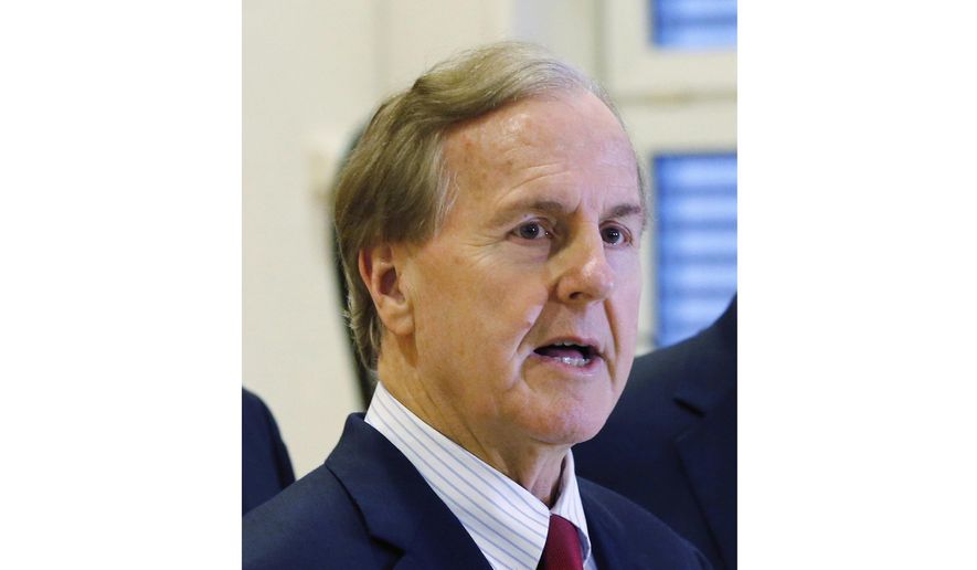 In this Monday Jan. 18, 2016, file photo, U.S. Rep. Robert Pittenger speaks to the media at the Landstuhl Regional Medical Center in Landstuhl, Germany. (AP Photo/Michael Probst, File)