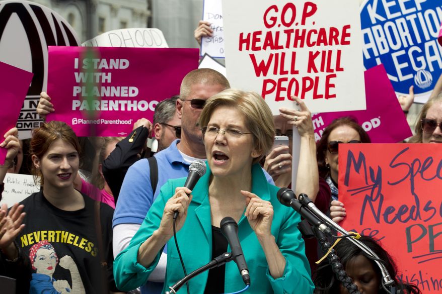 Sen. Elizabeth Warren, Massachusetts Democrat, spoke at a demonstration on Capitol Hill on Thursday after House Republicans pushed their legislative centerpiece scuttling much of former President Barack Obama's health care law. ( Associated Press)