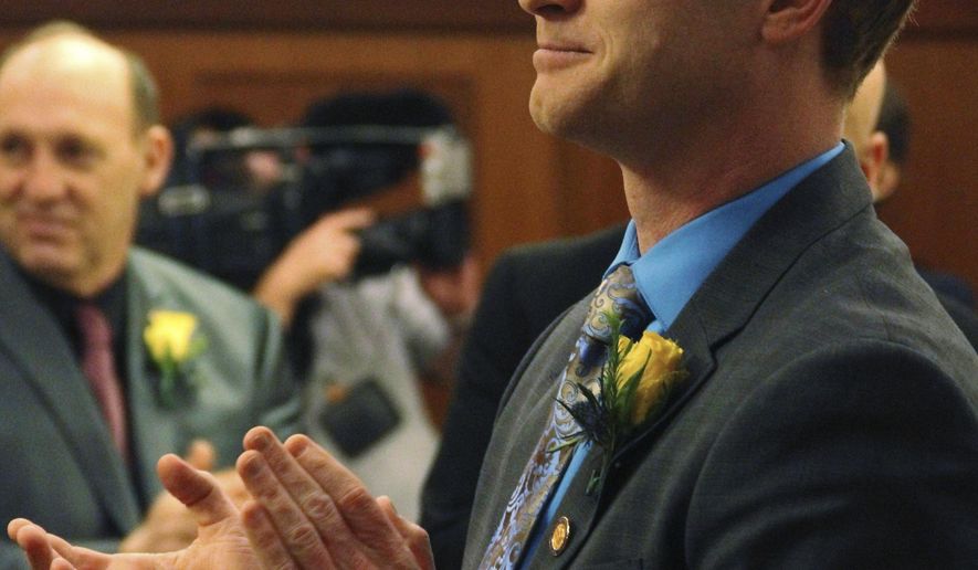 FILE - In this Jan. 17, 2017 file photo State Rep. David Eastman, a Republican freshman from Wasilla, is seen during the introduction of the newly-elected house speaker at the Alaska Legislature in Juneau, Alaska. Alaska lawmakers are demanding a public apology from Easton who said there are women in Alaska who try to get pregnant to get a "free trip to the city." Pressure mounted Friday, May 5, on Eastman, who has raised concerns with using state funds and Medicaid to cover abortions. (AP Photo/Mark Thiessen,File)