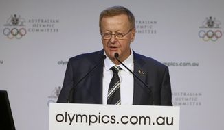 Australian Olympic Committee President John Coates comments on his re-election during the AOC&#39;s annual general meeting in Sydney, Saturday, May 6, 2017. Coates will serve another four-year term as president of the Australian Olympic Committee after beating former field hockey gold medalist Danni Roche by a landslide in an election. (AP Photo/Rick Rycroft)