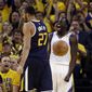 Golden State Warriors&#39; Draymond Green, right, celebrates after scoring next to Utah Jazz&#39;s Rudy Gobert (27) during the second half in Game 2 of an NBA basketball second-round playoff series, Thursday, May 4, 2017, in Oakland, Calif. (AP Photo/Marcio Jose Sanchez)