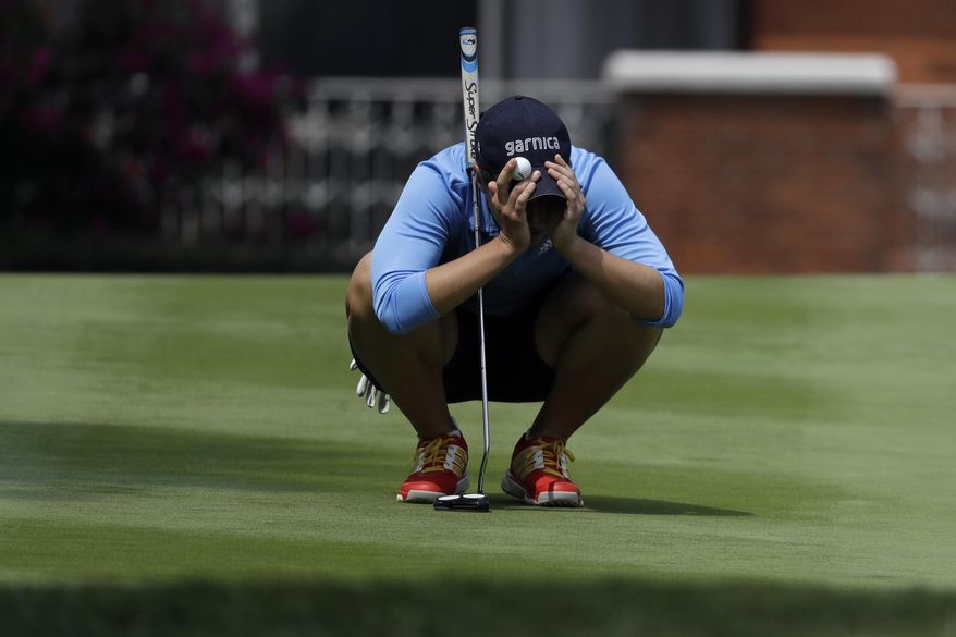 Carlota Ciganda, of Spain, lines up a putt on the 17th hole during round two of the Lorena Ochoa Invitational at Mexico Golf Club in Mexico City, Friday, May 5, 2017. The invitational, the tenth of the 2017 LPGA tour, is the tour's first Match Play event since 2012. (AP Photo/Rebecca Blackwell)