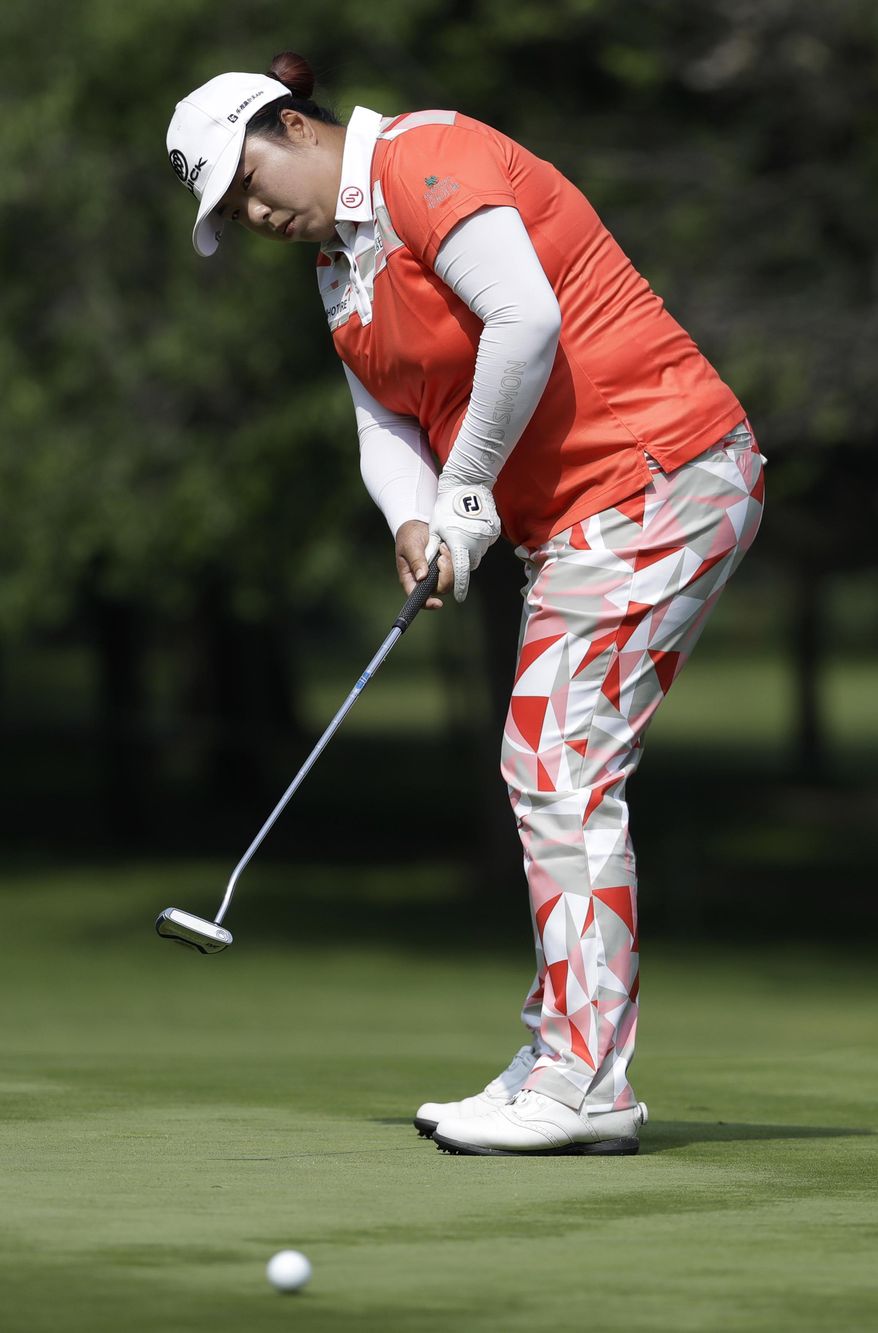 Shanshan Feng, of China, putts on the 2nd hole during round two of the Lorena Ochoa Invitational at Mexico Golf Club in Mexico City, Friday, May 5, 2017. The invitational, the tenth of the 2017 LPGA tour, is the tour's first Match Play event since 2012. (AP Photo/Rebecca Blackwell)