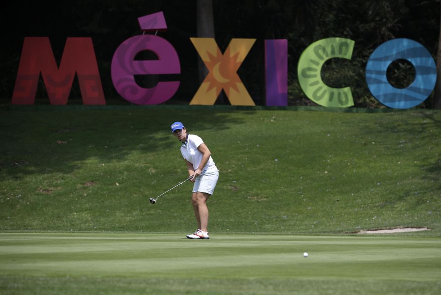 Karine Icher, of France, putts on the 18th hole during round two of the Lorena Ochoa Invitational at Mexico Golf Club in Mexico City, Friday, May 5, 2017. The invitational, the tenth of the 2017 LPGA tour, is the tour's first Match Play event since 2012. (AP Photo/Rebecca Blackwell)