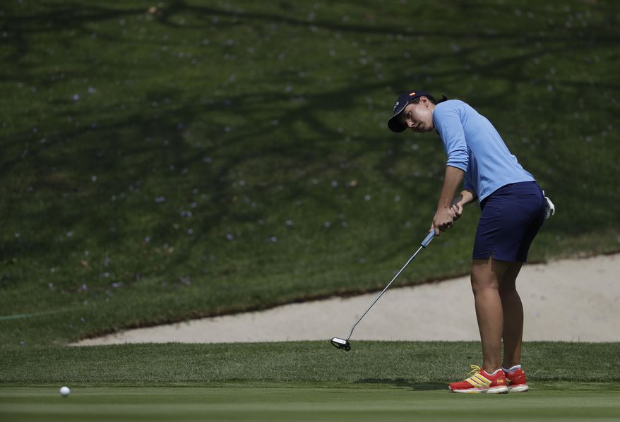 Carlota Ciganda, of Spain, putts on the 18th hole during round two of the Lorena Ochoa Invitational at Mexico Golf Club in Mexico City, Friday, May 5, 2017. The invitational, the tenth of the 2017 LPGA tour, is the tour's first Match Play event since 2012. (AP Photo/Rebecca Blackwell)