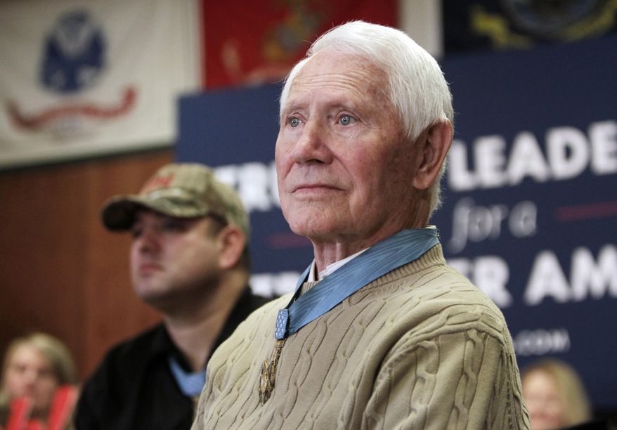 FILE - In this Jan. 30, 2016, file photo, retired U.S. Air Force Col. Leo K. Thorsness, who was awarded the Medal of Honor for heroism as an Air Force pilot during the Vietnam War, is seen at a presidential campaign event in Clear Lake, Iowa. Thorsness died of leukemia in Florida on Tuesday, May 2, 2017, according to his wife. He was 85. Thorsness was once cellmates in a Vietnamese prison camp dubbed the "Hanoi Hilton" with U.S. Sen John McCain. (AP Photo/Kiichiro Sato, File)