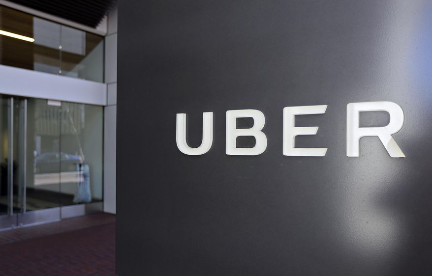 FILE- This March 1, 2017, file photo shows an exterior view of the headquarters of Uber in San Francisco. The Justice Department is probing allegations that Uber used phony software to thwart city inquiries into whether the ride-hailing company followed local regulations. The city of Portland, Ore., says in an April 2017 audit report that it was notified of the federal inquiry by the U.S. Attorney’s Office in San Francisco. Portland said it’s cooperating. Uber and the U.S. Attorney’s Office declined comment. (AP Photo/Eric Risberg, File)