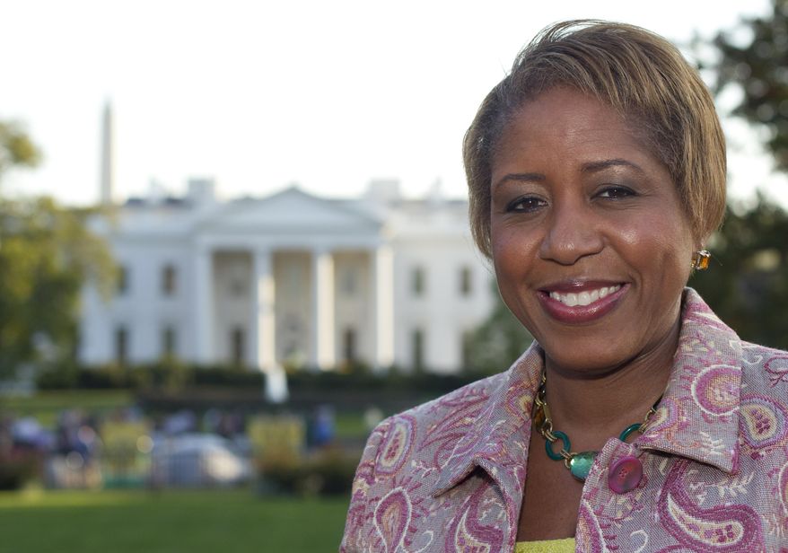 FILE - In this Oct. 18, 2011 file photo, the then-incoming White House chief usher Angella Reid is photographed in Lafayette Park across from the White House in Washington. The White House has fired Reid, the person who responsible for managing the residence and staff its and overseeing events. No reason was given for Reid’s dismissal. (AP Photo/Carolyn Kaster, File)