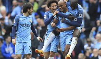 Manchester City&#x27;s Vincent Kompany celebrates scoring his side&#x27;s second goal of the game during the Premier League soccer match between Manchester City and Crystal Palace at The Etihad Stadium, Manchester, England. Saturday May 6, 2017. (Mike Egerton/PA via AP)