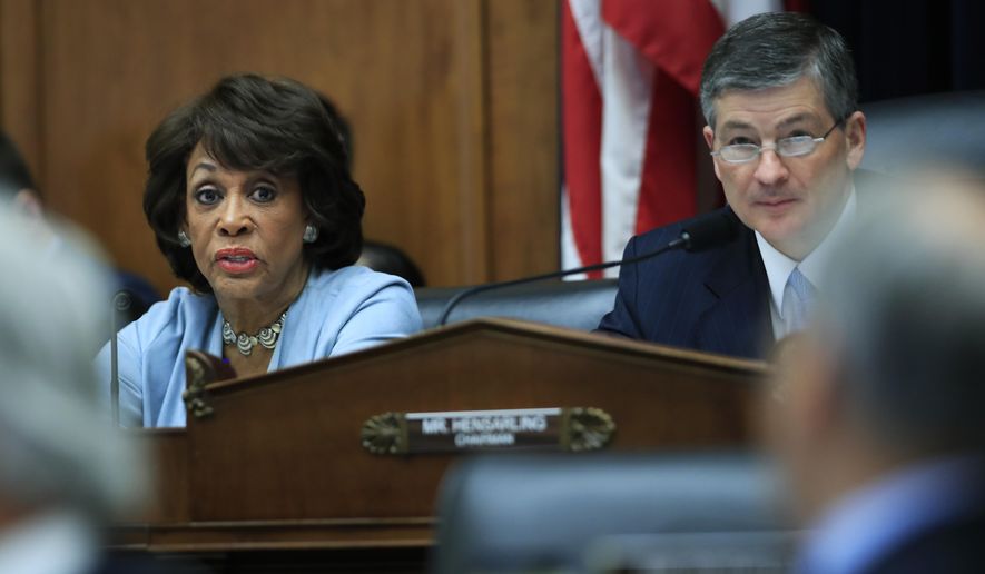 The House Financial Services Committee's ranking member Rep. Maxine Waters D-Calif., left, with committee Chairman Jeb Hensarling, R-Texas, speaks on Capitol Hill in Washington, Tuesday, May 2, 2017, during the committee's hearing on overhauling the nation's financial rules. (AP Photo/Manuel Balce Ceneta)