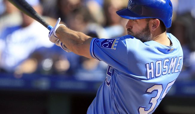 Kansas City Royals' Eric Hosmer hits an RBI single off Cleveland Indians starting pitcher Josh Tomlin during the fourth inning of a baseball game at Kauffman Stadium in Kansas City, Mo., Saturday, May 6, 2017. (AP Photo/Orlin Wagner)