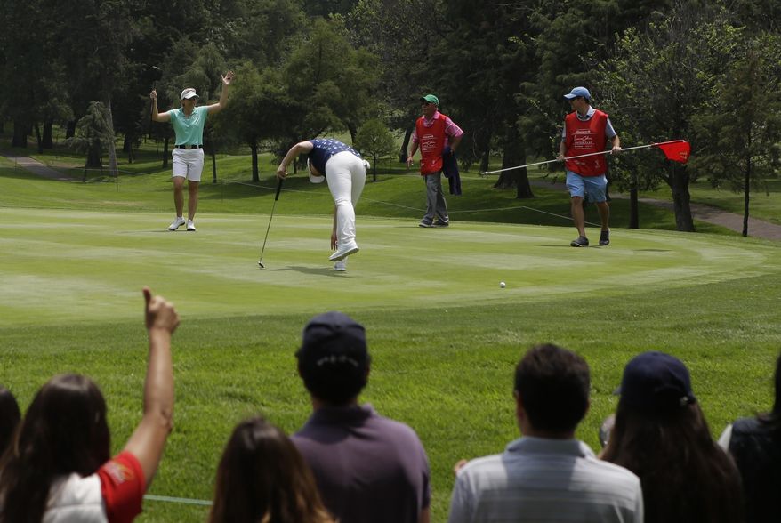 Sweden's Annika Sorenstam acknowledges cheers from the crowd after putting on the 11th hole during a Hall of Fame exhibition match at the Lorena Ochoa Invitational at Mexico Golf Club in Mexico City, Saturday, May 6, 2017. The invitational, the tenth of the 2017 LPGA tour, is the tour's first Match Play event since 2012. (AP Photo/Rebecca Blackwell)