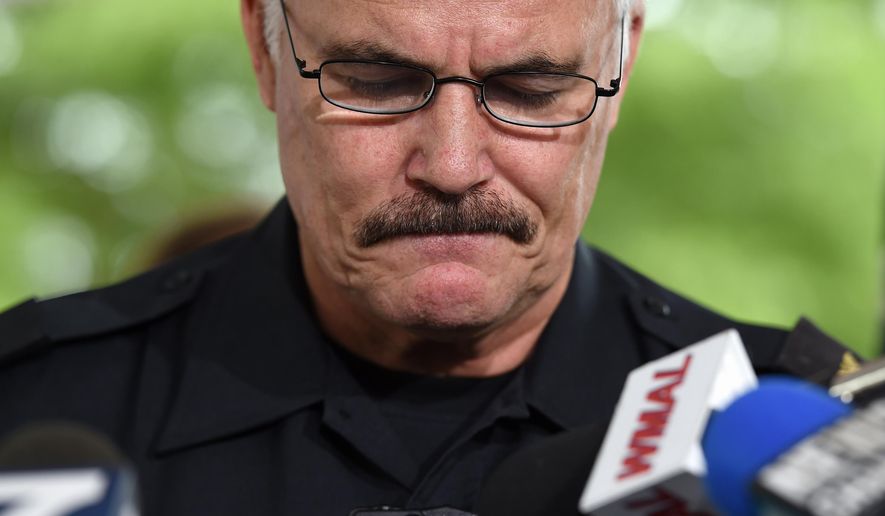 Montgomery County, Md. Police Chief J. Thomas Manger pauses during a news conference in Wheaton, Md., Wednesday, July 15, 2015, to discuss developments in the investigation of the disappearance of 10-year-old Katherine Lyon and 12-year-old Shelia Lyon in 1975. Authorities on Wednesday announced first-degree murder charges against an imprisoned sex offender in the disappearance of two sisters from a suburban Maryland mall in 1975, bringing some clarity to the baffling case that made parents question whether to allow children out of their homes alone. (AP Photo/Molly Riley)