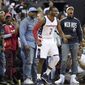 Washington Wizards guard John Wall (2) reacts during the second half in Game 4 of a second-round NBA basketball playoff series against the Boston Celtics, Sunday, May 7, 2017, in Washington. (AP Photo/Nick Wass)