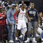 Washington Wizards guard John Wall (2) reacts during the second half in Game 4 of a second-round NBA basketball playoff series against the Boston Celtics, Sunday, May 7, 2017, in Washington. (AP Photo/Nick Wass) **FILE**