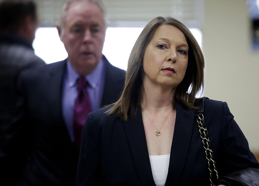 FILE - In this Thursday, Dec. 15, 2016, file photo, Tulsa Police Officer Betty Shelby leaves the Tulsa County Courthouse after her court appearance in Tulsa, Okla. Shelby's manslaughter trial begins Monday, May 8, 2017, in the shooting of Terence Crutcher, an unarmed black man. (Mike Simons/Tulsa World via AP, File)
