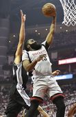 spurs_rockets_basketball_72207.jpg